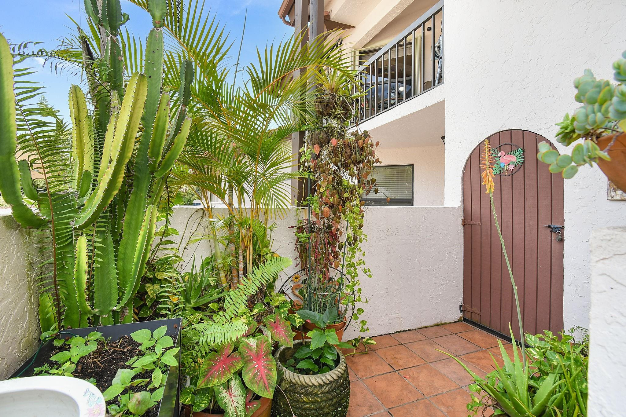 6040 Southeast Martinique Drive, Unit 201 Stuart, FL 34997 - Photo 38 of 63 PRIVATE COURTYARD WITH STORAGE