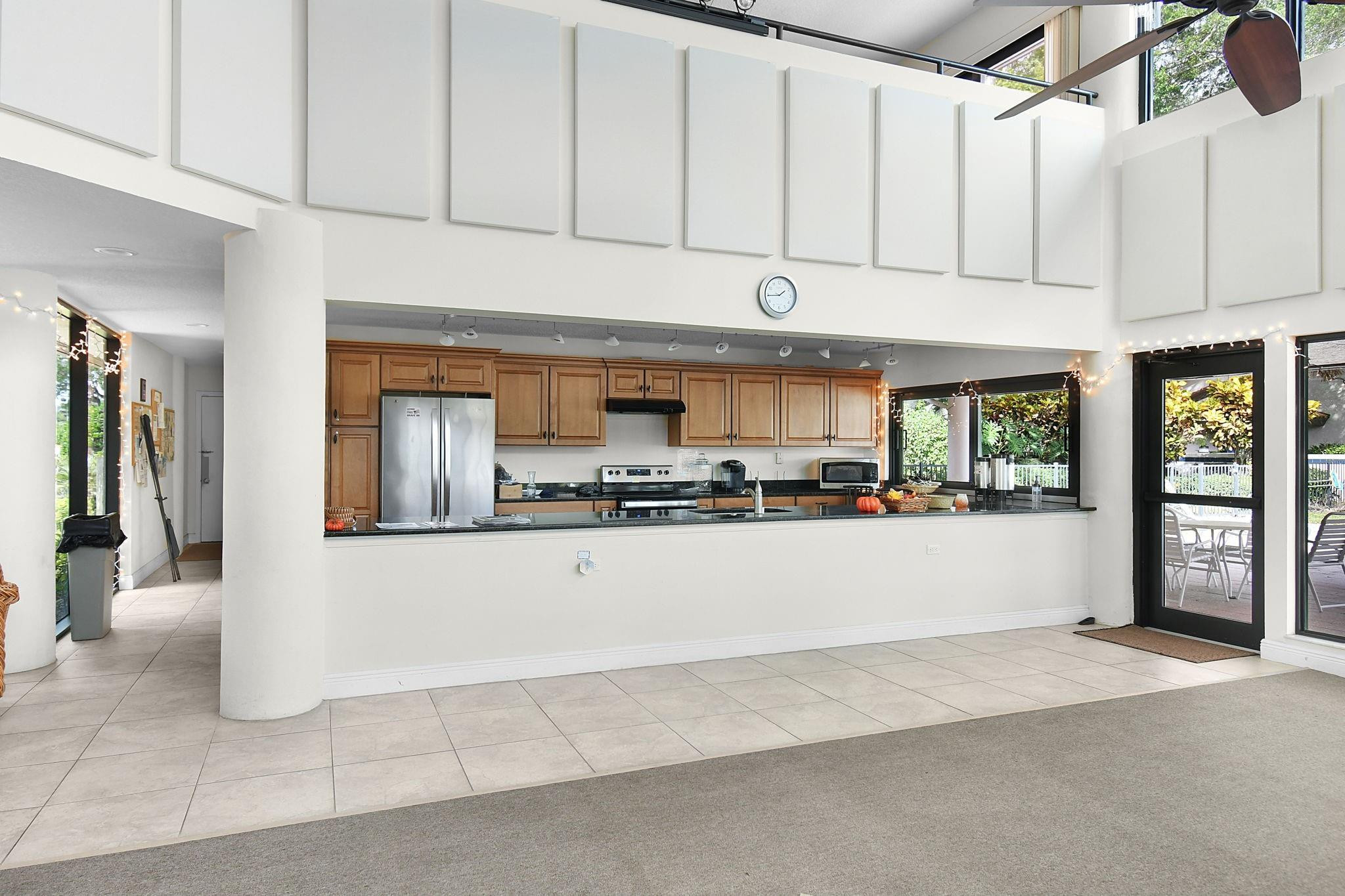 6040 Southeast Martinique Drive, Unit 201 Stuart, FL 34997 - Photo 47 of 63 CLUBHOUSE KITCHEN