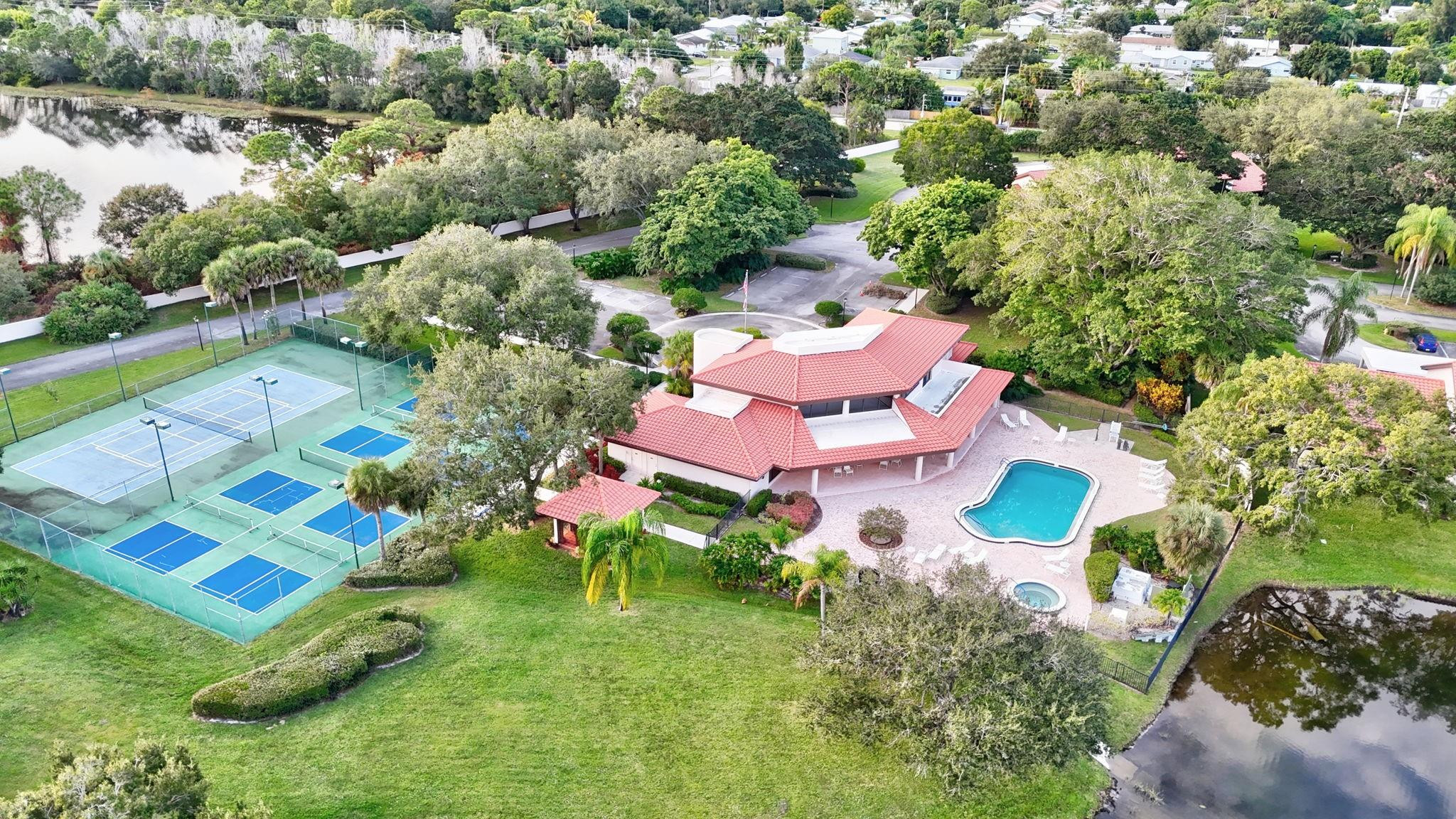 6040 Southeast Martinique Drive, Unit 201 Stuart, FL 34997 - Photo 57 of 63 TENNIS AND PICKLE BALL COURTS