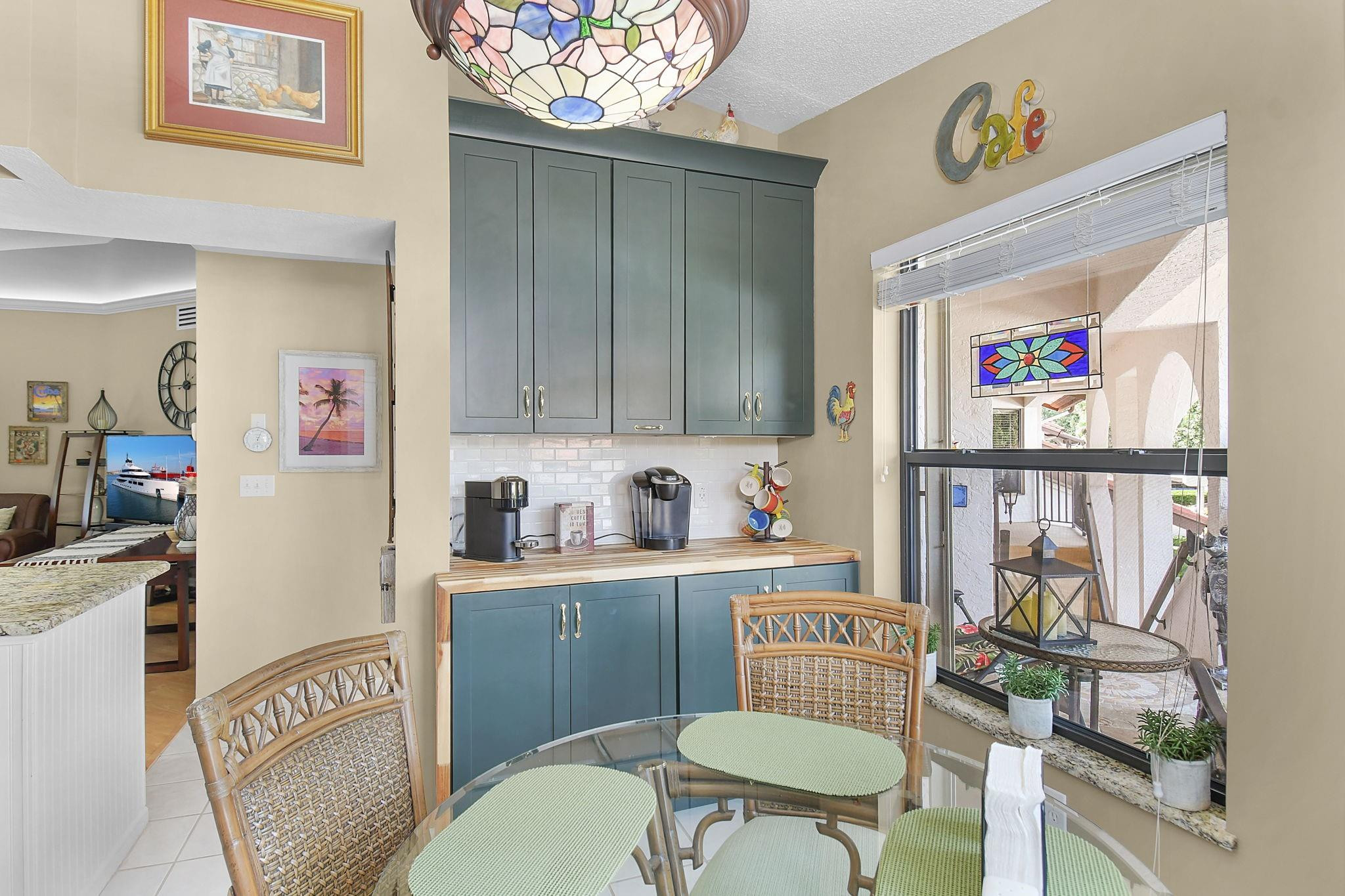 6040 Southeast Martinique Drive, Unit 201 Stuart, FL 34997 - Photo 9 of 63 BEAUTIFUL COFFEE BAR