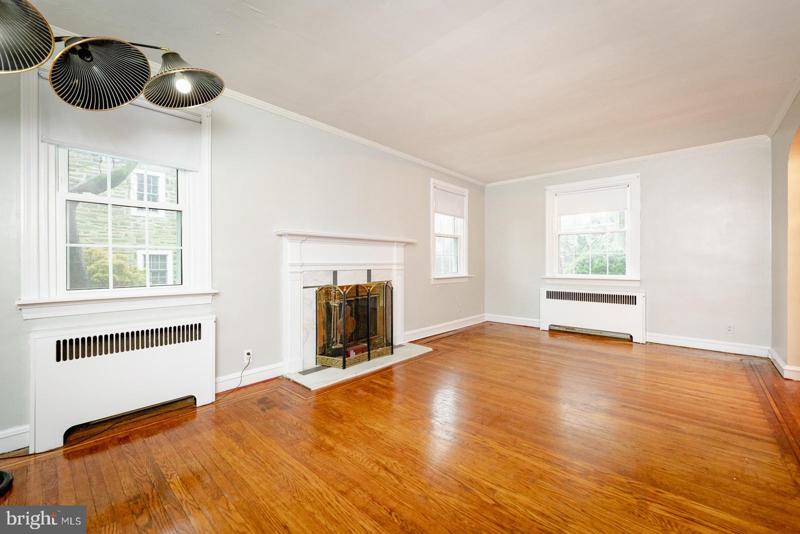 637 Croyden Road Cheltenham, PA 19012 - Photo 11 of 48 a view of empty room with wooden floor and fan