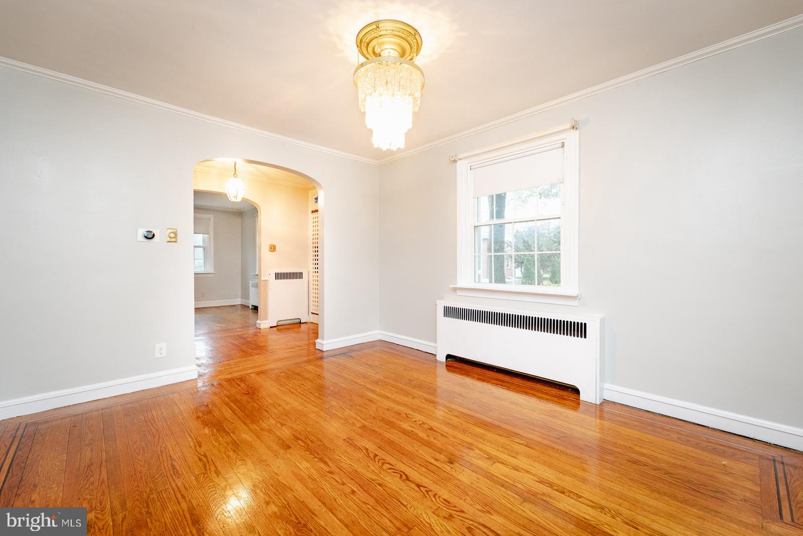 637 Croyden Road Cheltenham, PA 19012 - Photo 17 of 48 a view of empty room with wooden floor and fan