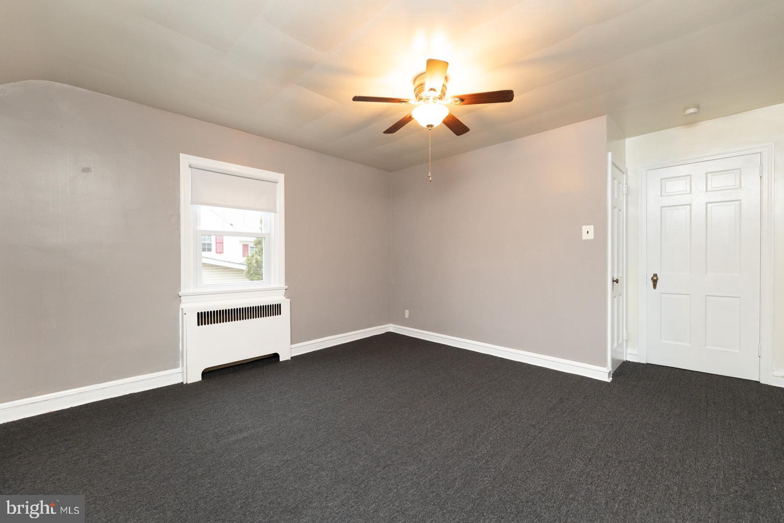 637 Croyden Road Cheltenham, PA 19012 - Photo 25 of 48 an empty room with windows and fan