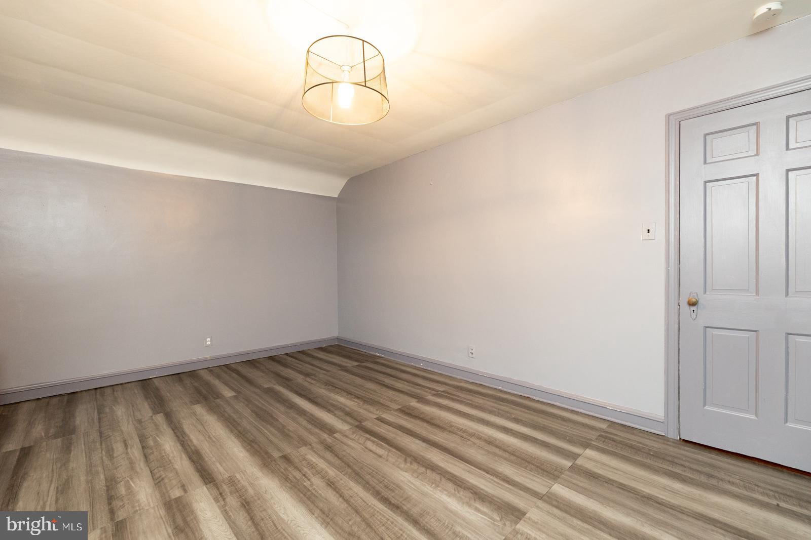 637 Croyden Road Cheltenham, PA 19012 - Photo 27 of 48 a view of a room with wooden floor and white walls