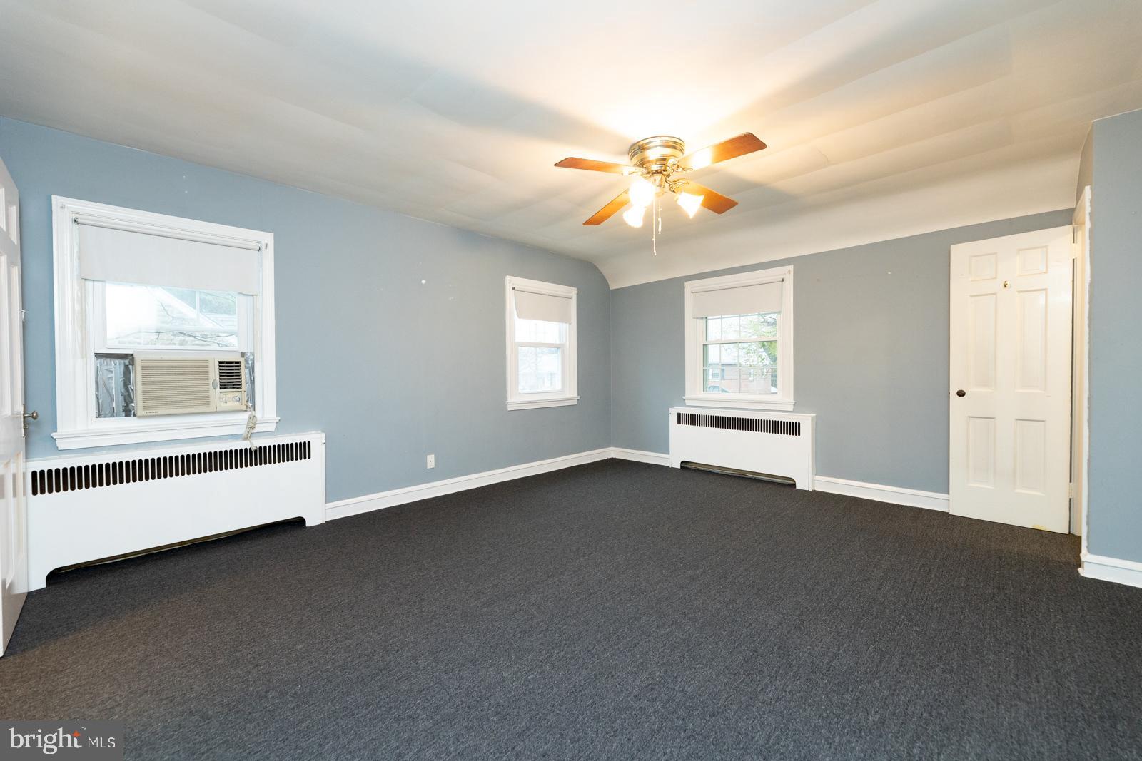 637 Croyden Road Cheltenham, PA 19012 - Photo 30 of 48 an empty room with windows and fan