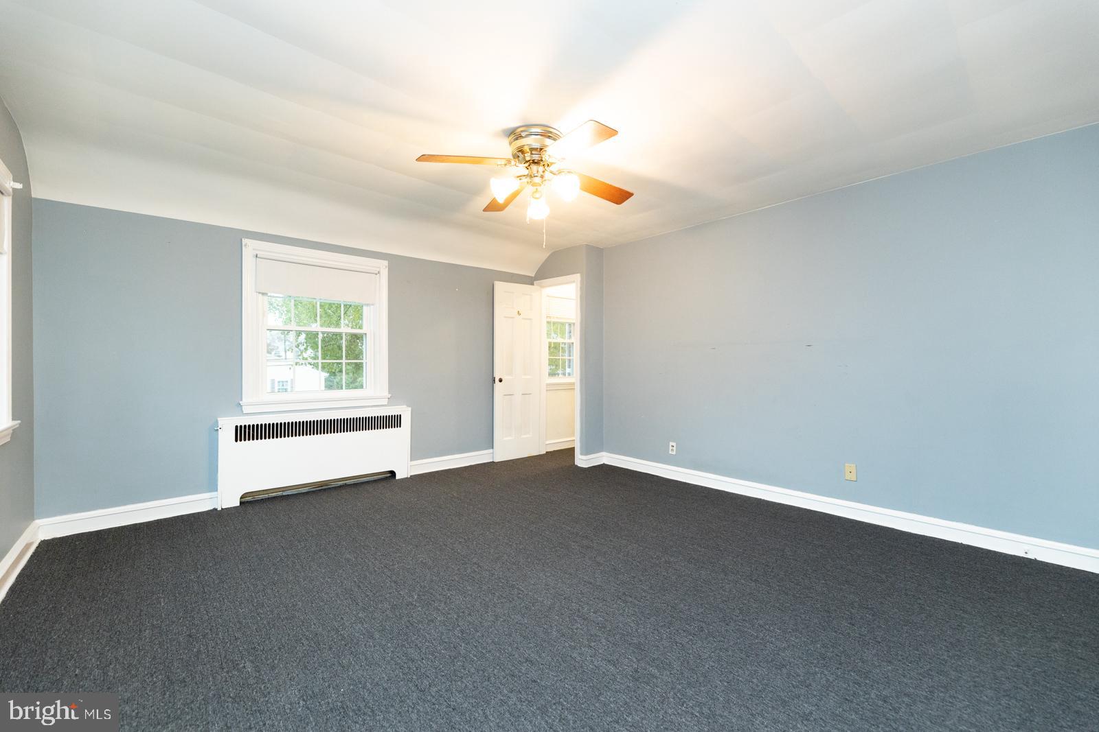 637 Croyden Road Cheltenham, PA 19012 - Photo 33 of 48 an empty room with windows and fan