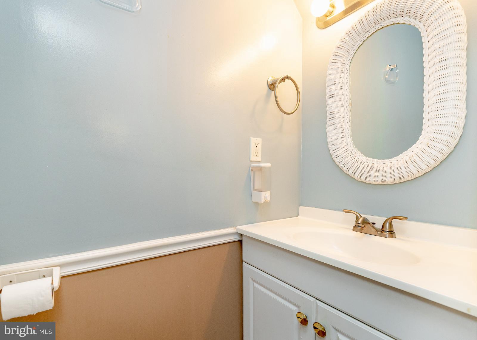 637 Croyden Road Cheltenham, PA 19012 - Photo 46 of 48 a bathroom with a sink and a mirror