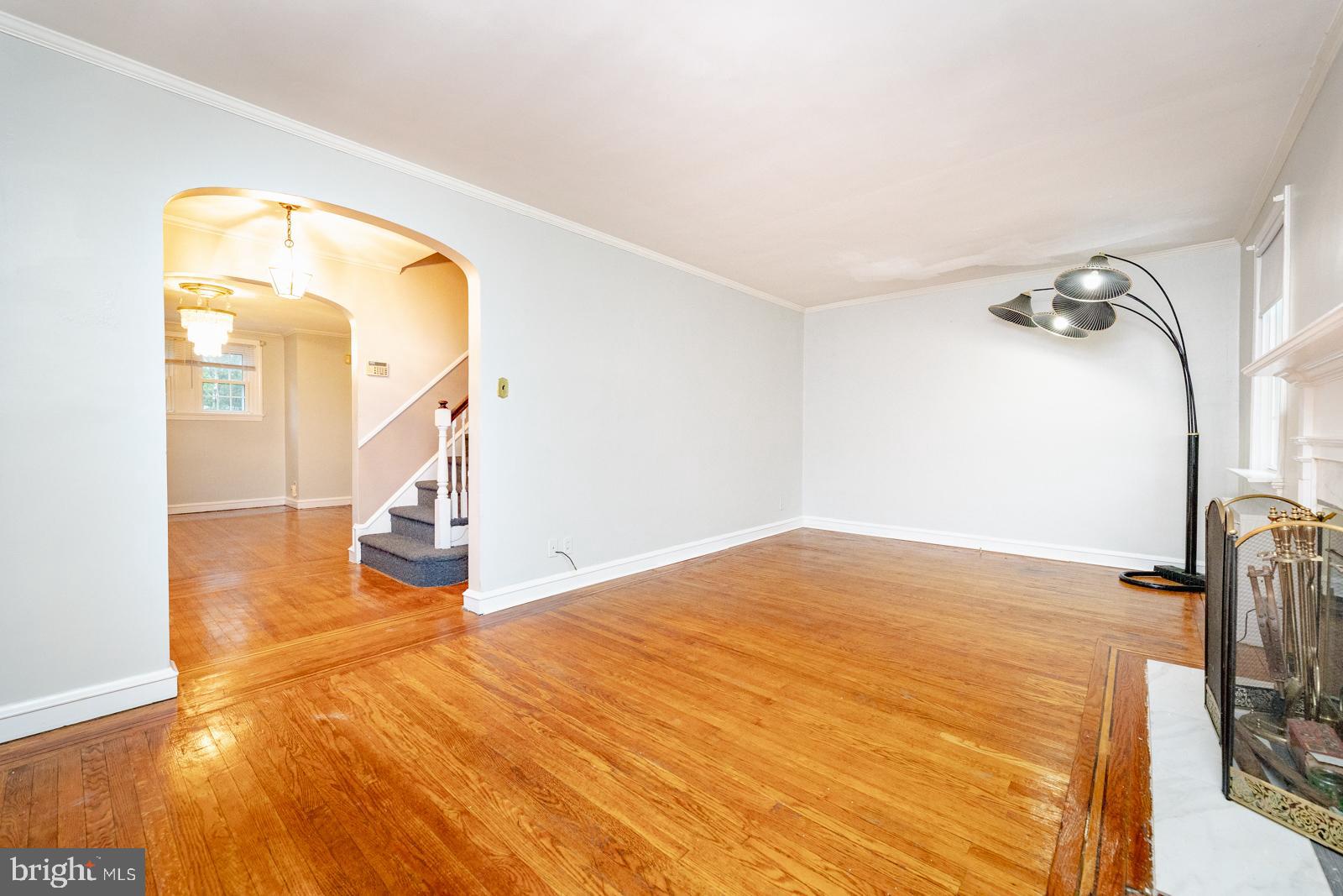 637 Croyden Road Cheltenham, PA 19012 - Photo 9 of 48 a view of empty room with wooden floor and fan