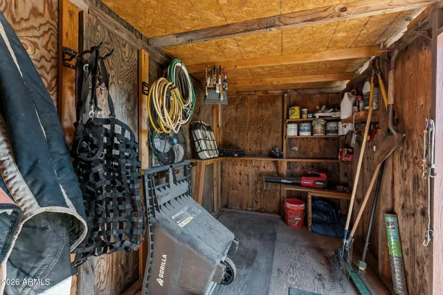 a view of a street with a bench in front of it
