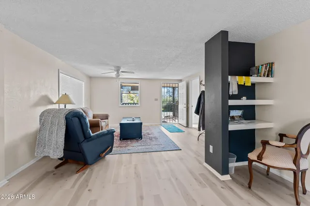 a living room with furniture and a couch