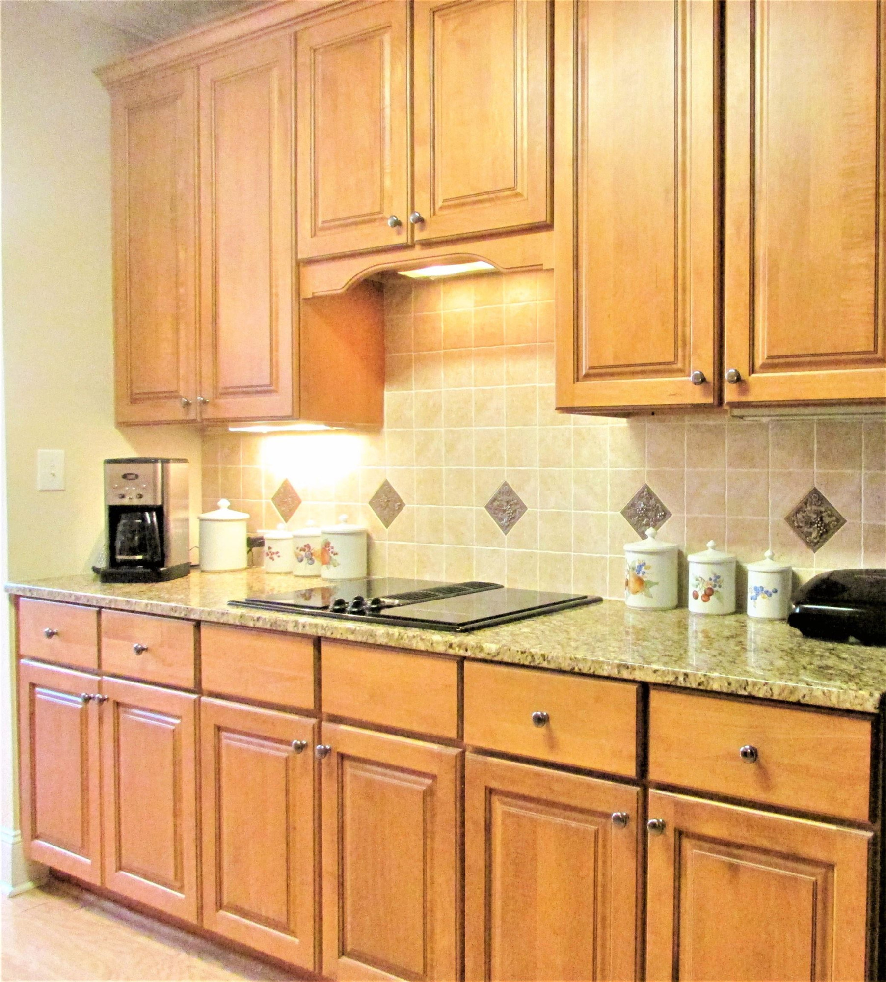 3700 Baron Cooper Pass, Unit 103 Raleigh, NC 27612 - Photo 15 of 24 Kitchen Jenn Aire