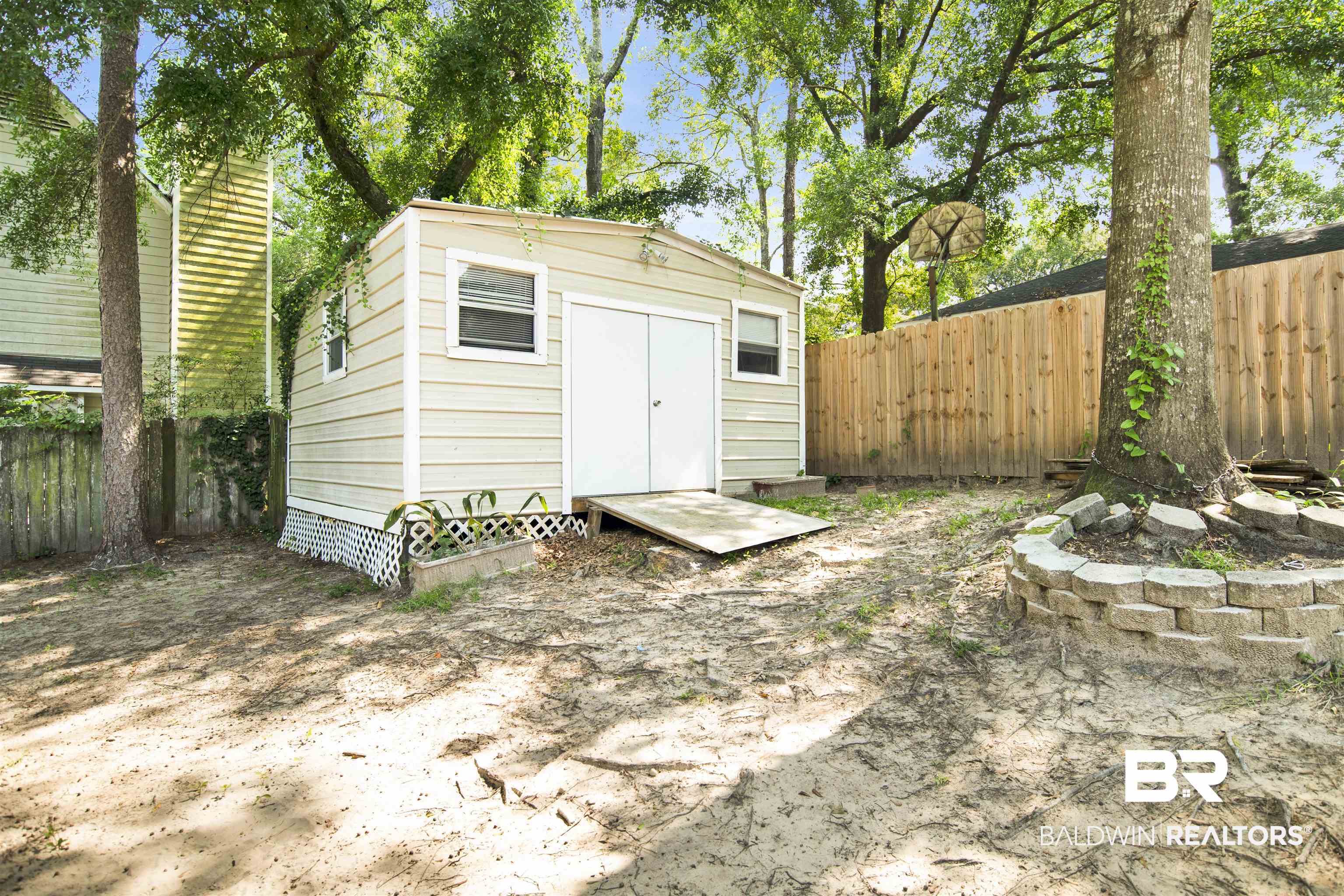 3412 Peyton Court Mobile, AL 36695 - Photo 25 of 27 View of shed with a fenced backyard