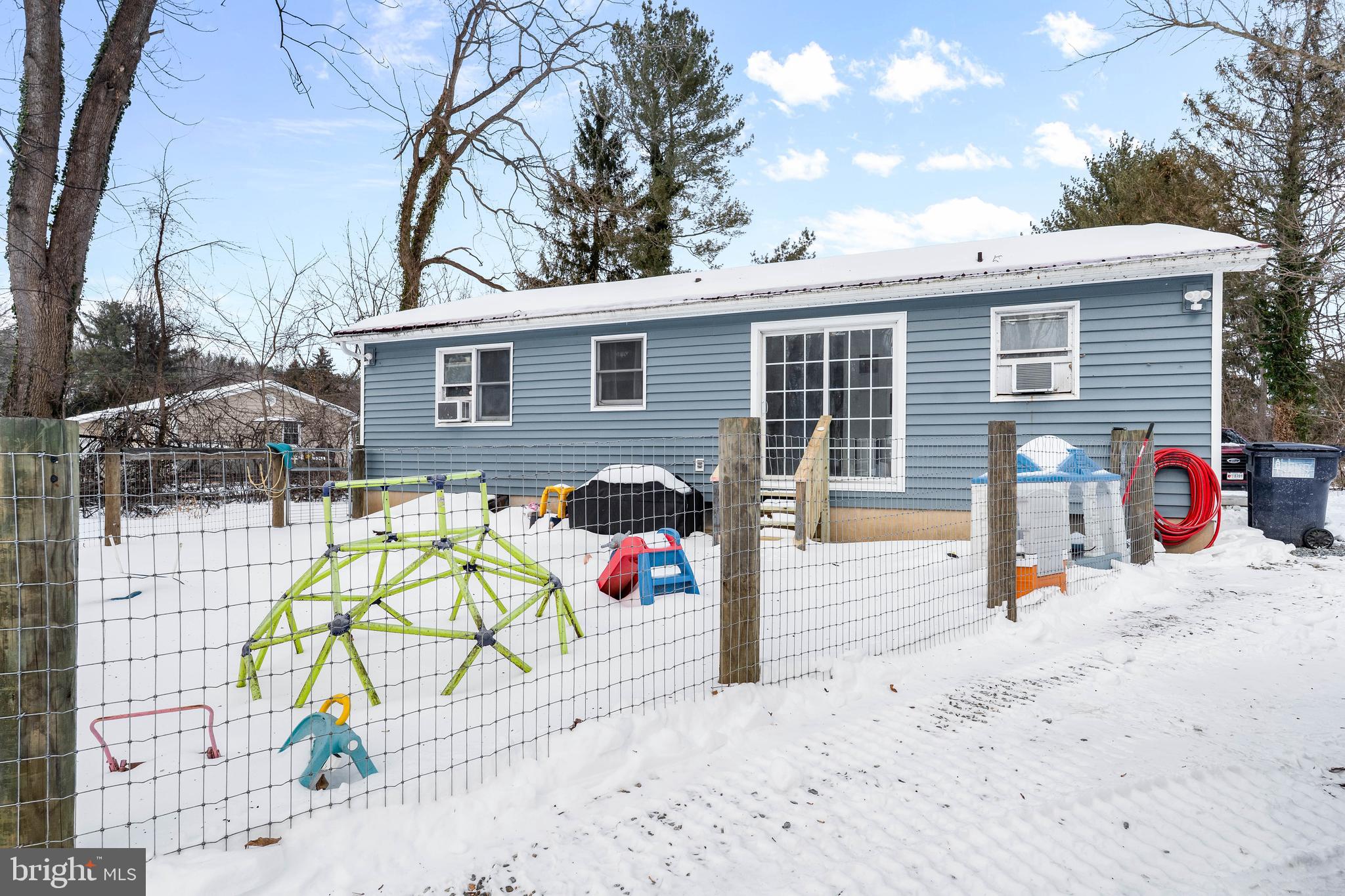1500 Dr Jack Road Conowingo, MD 21918 - Photo 3 of 23 Back of home small area fenced for dogs