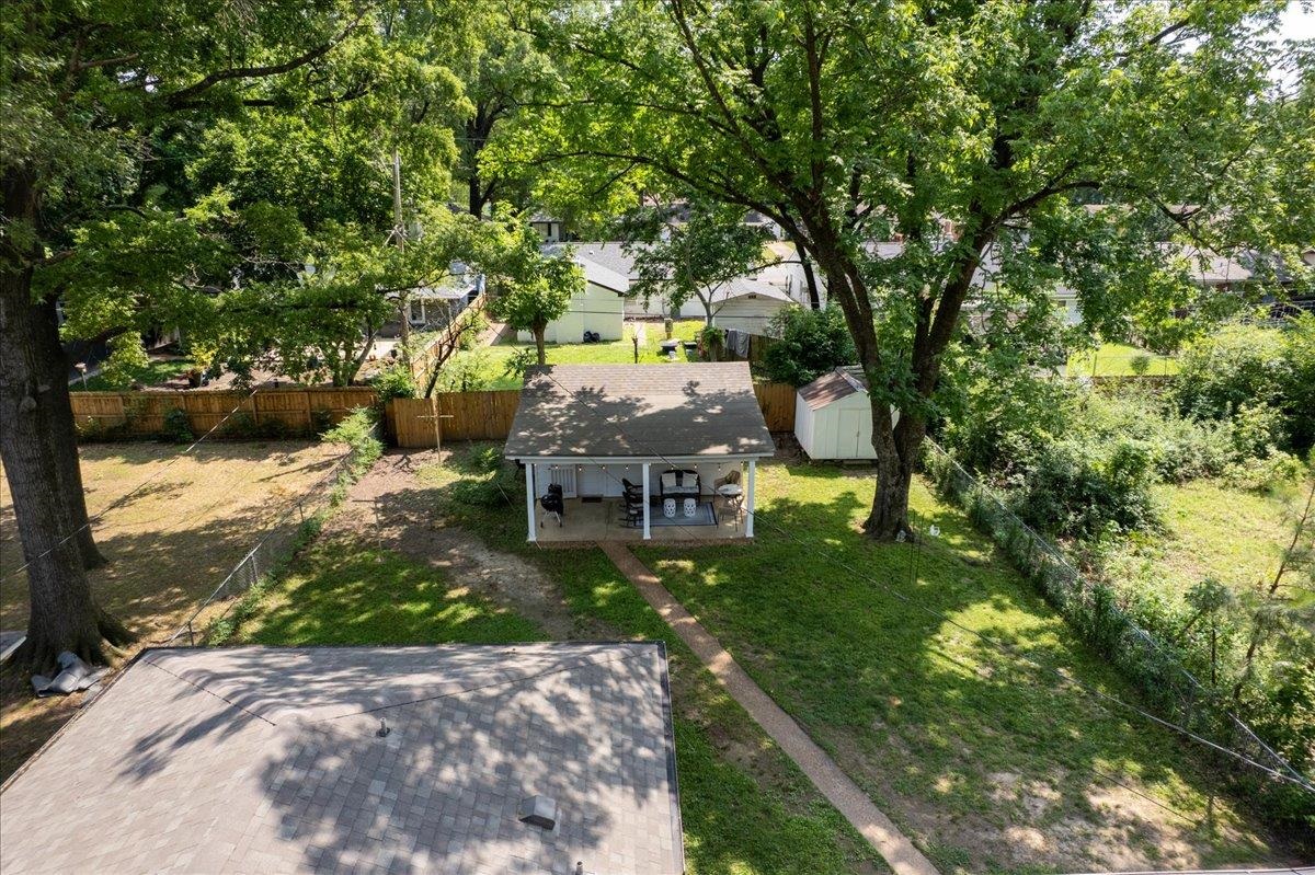 4491 Garnett Road Memphis, TN 38117 - Photo 30 of 32 a backyard of a house with table and chairs