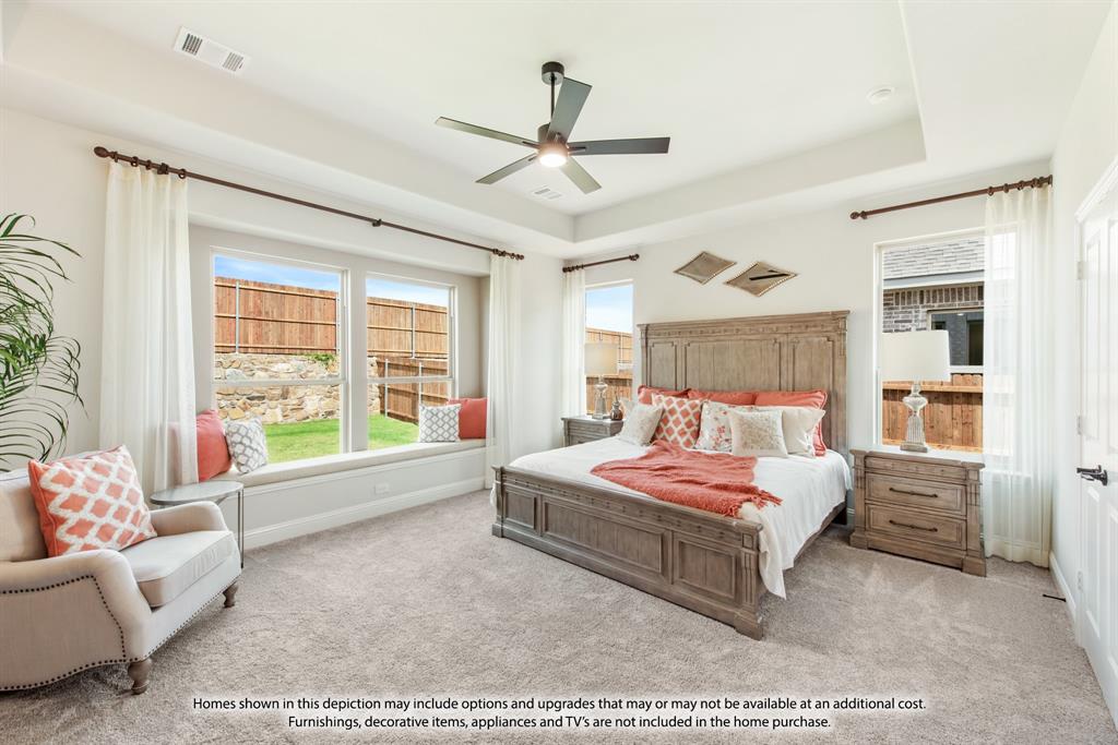 5610 Rutherford Drive Midlothian, TX 76065 - Photo 20 of 26 a bedroom with a bed window and couch