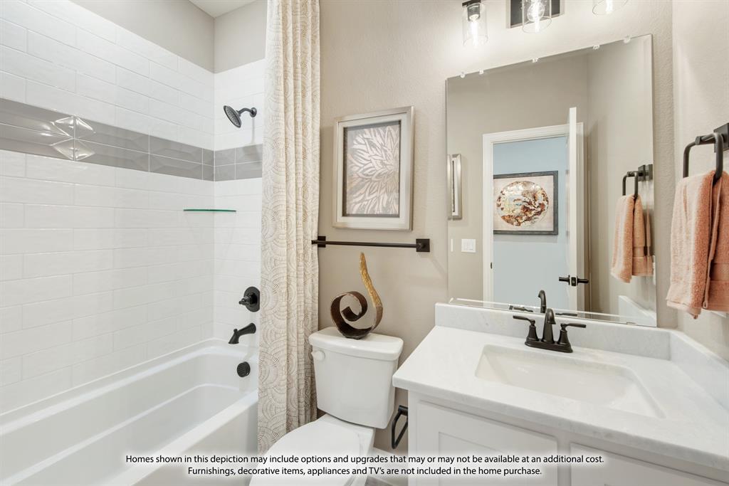 5610 Rutherford Drive Midlothian, TX 76065 - Photo 26 of 26 a bathroom with a sink a toilet and a bathtub