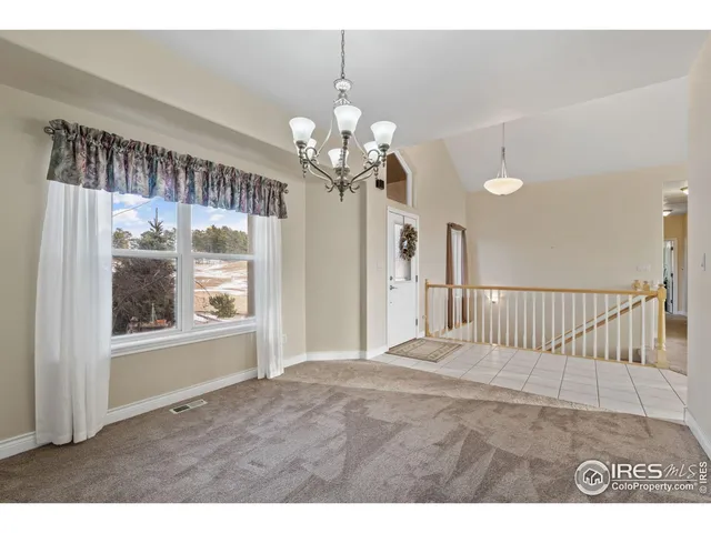 a view of a chandelier in a room
