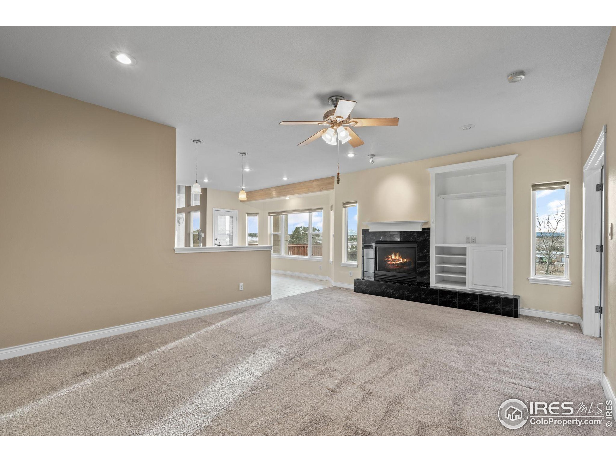 17035 Herring Road Colorado Springs, CO 80908 - Photo 20 of 38 a view of an empty room with a window