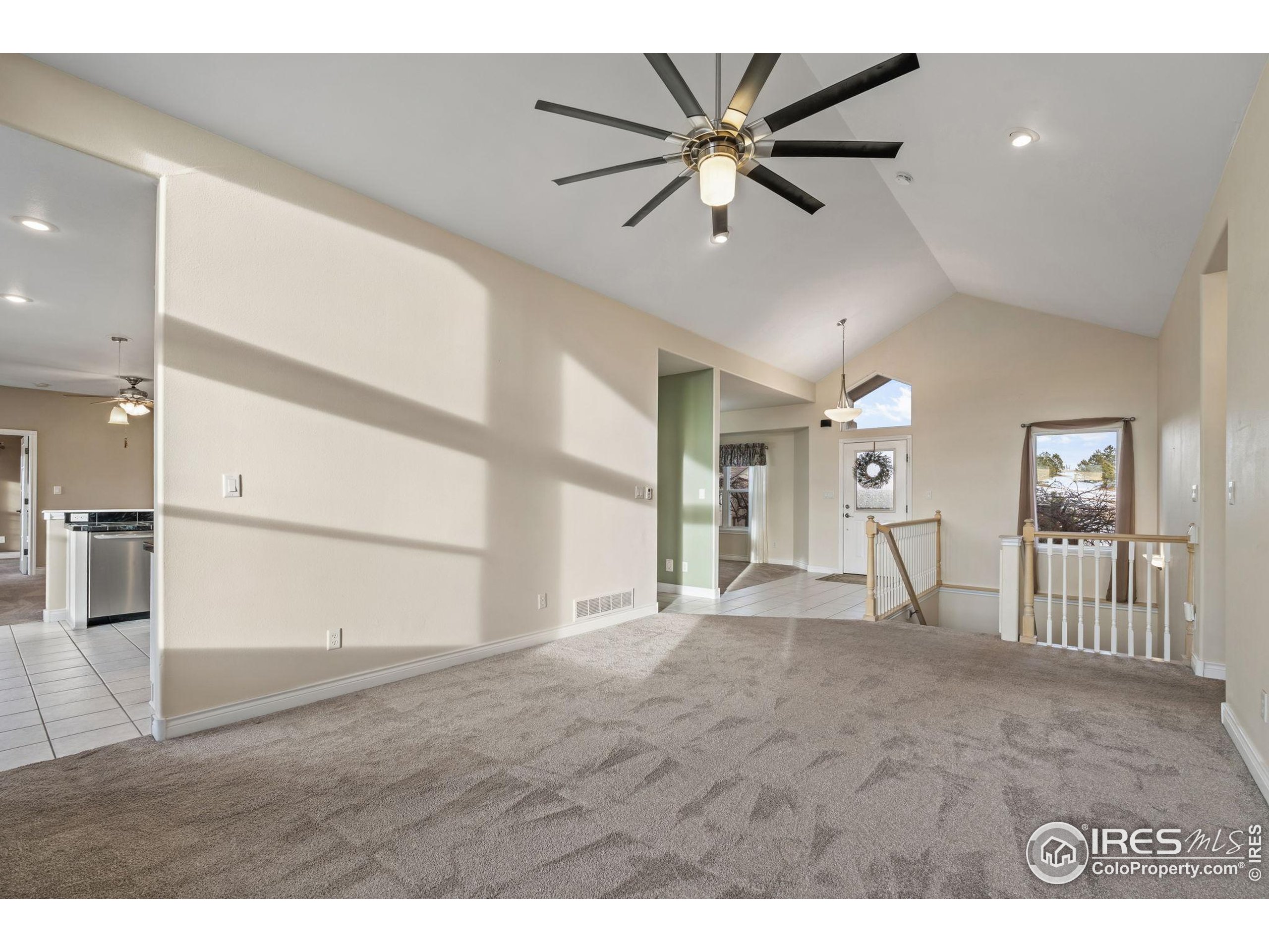 17035 Herring Road Colorado Springs, CO 80908 - Photo 10 of 38 a view of an empty room with a window