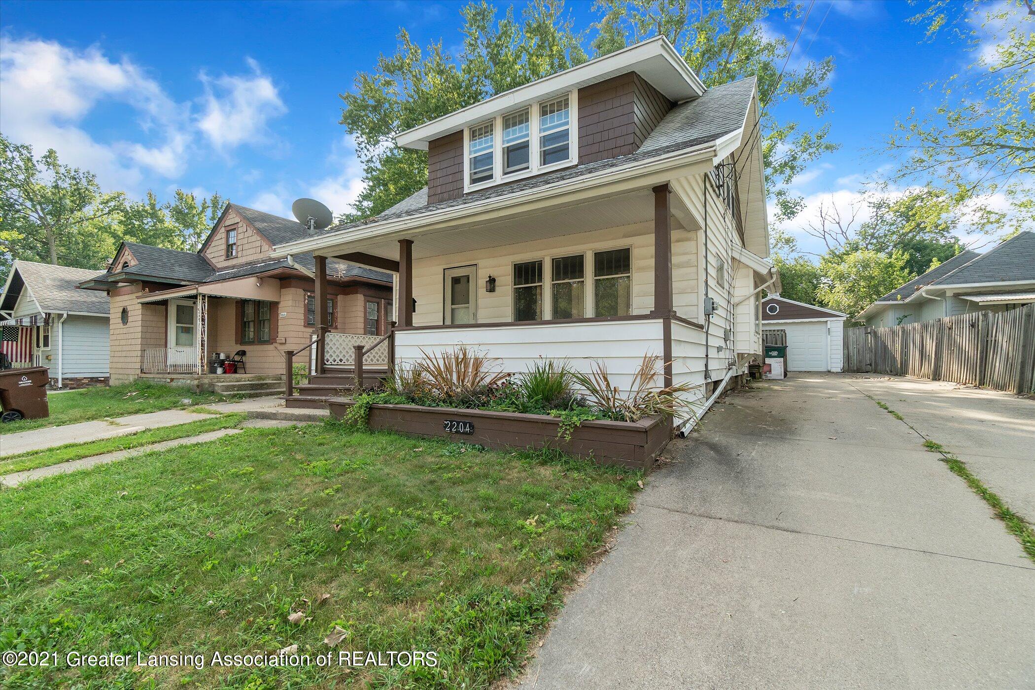 2204 South Rundle Avenue Lansing, MI 48910 - Photo 1 of 31 04-2204 S. Rundle Ave-Windowstill-Real-E
