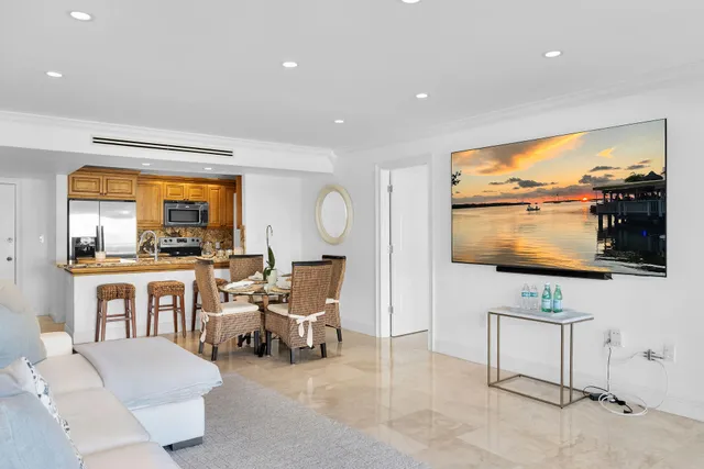 a bedroom with a bed and a night stand