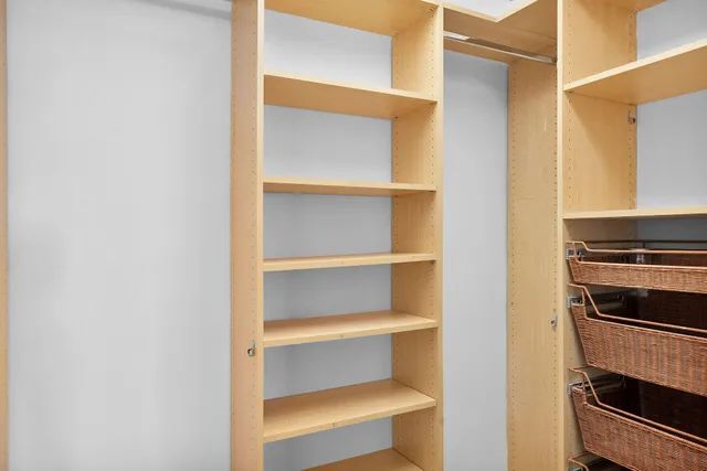 a living room with projector and a flat screen tv