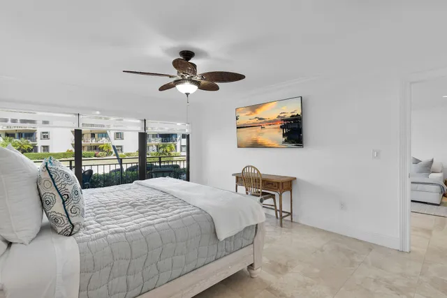 a view of a house with a flower garden