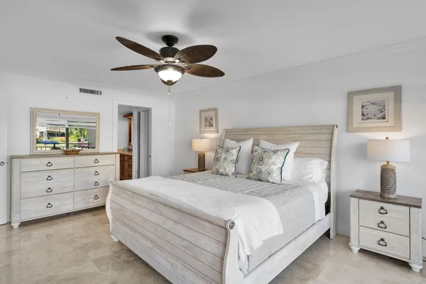 an aerial view of a house with a lake view