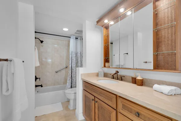 a view of a swimming pool with a garden and trees