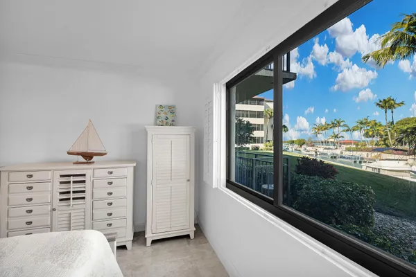 a living room with projector and a flat screen tv