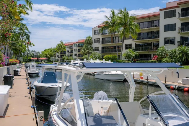 an aerial view of a house with a lake view