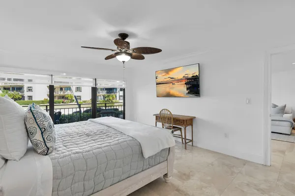 a view of a house with a flower garden