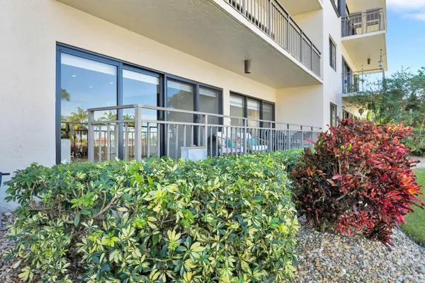 a view of a lake with a car parked in front of it
