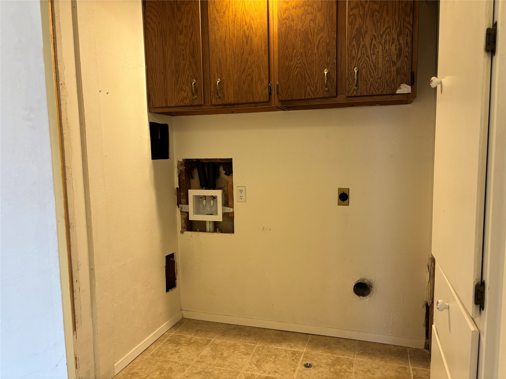 1748 Ohlen Road, Unit 9 Austin, TX 78757 - Photo 20 of 40 In unit washer and dryer area.