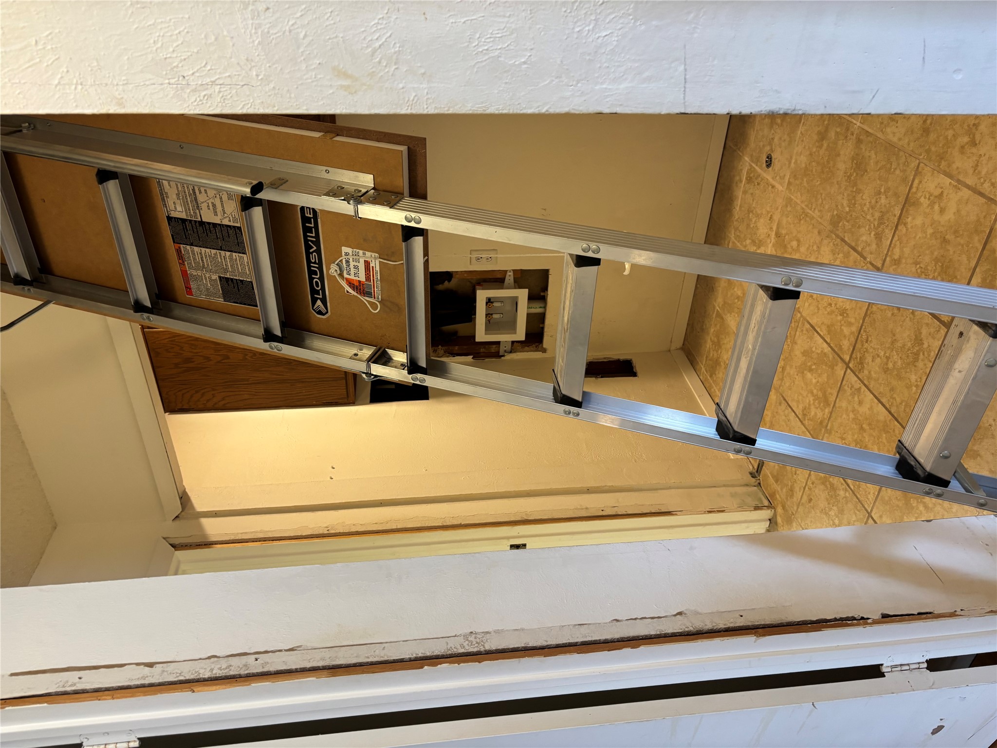 1748 Ohlen Road, Unit 9 Austin, TX 78757 - Photo 34 of 40 Attic access if you want to add room-finish the floor up there!