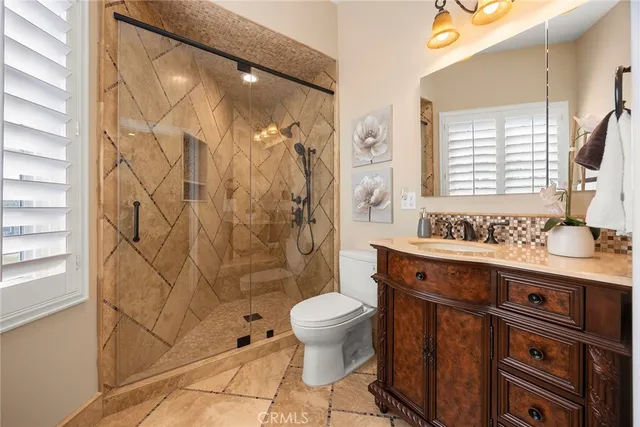 a view of a chairs and table in a patio