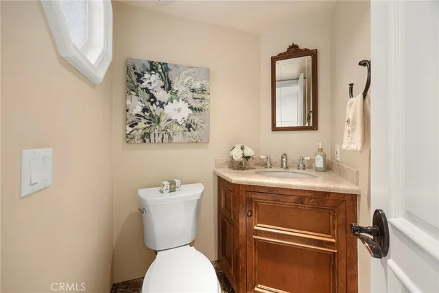 a view of a house with swimming pool and a yard