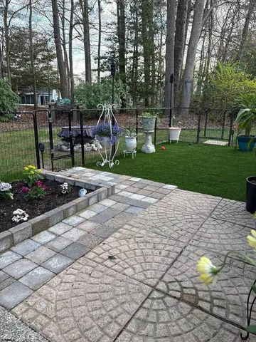 a view of a backyard with a garden