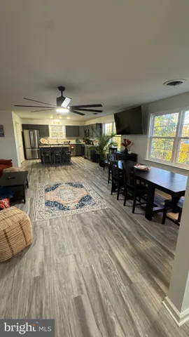 a view of a livingroom and dining room
