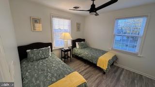 1546 Savannah Road Lewes, DE 19958 - Photo 5 of 8 a bedroom with a bed couch and window