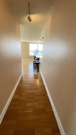 a view of dining room with a table and chairs