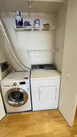 a utility room with dryer and washer