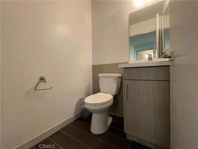 a bathroom with a toilet and a sink