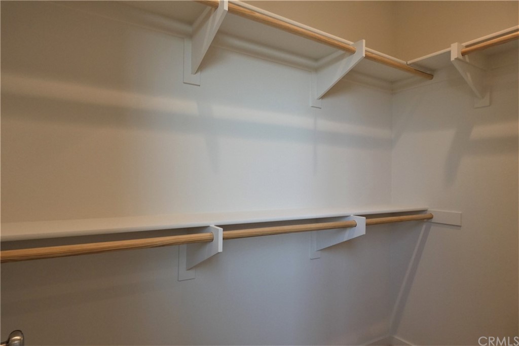 206 Oak Forest Irvine, CA 92618 - Photo 22 of 42 a close up view of racks on the wall