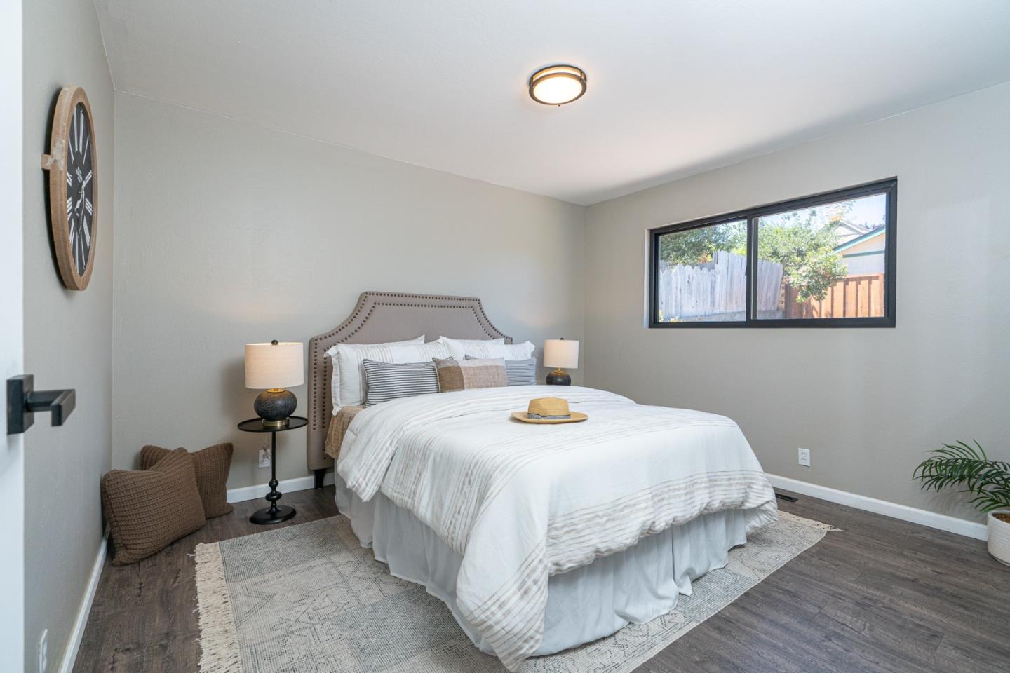 1055 Tweed Street Seaside, CA 93955 - Photo 12 of 33 a bedroom with bed and a window