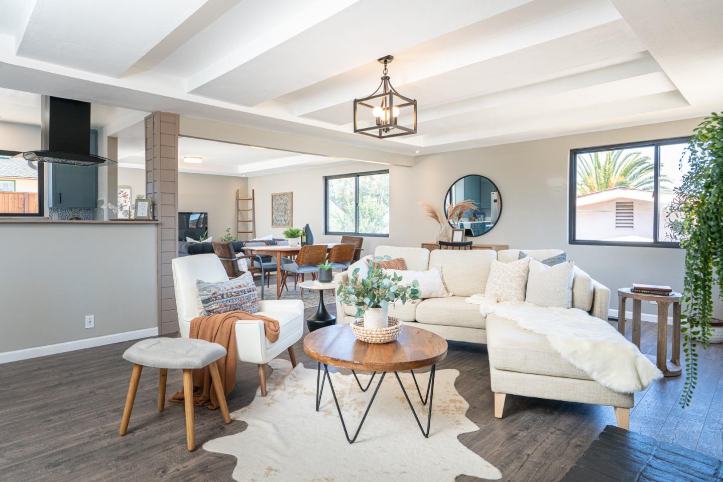 1055 Tweed Street Seaside, CA 93955 - Photo 3 of 33 a living room with furniture a dining table and a large window
