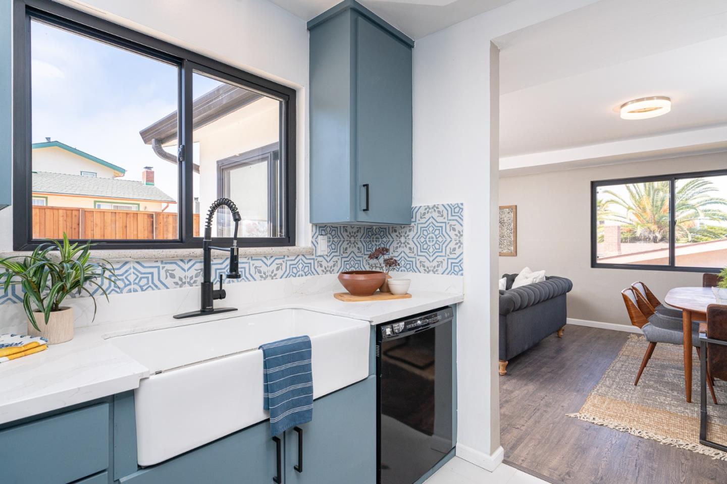 1055 Tweed Street Seaside, CA 93955 - Photo 7 of 33 a kitchen with a stove a sink and a refrigerator