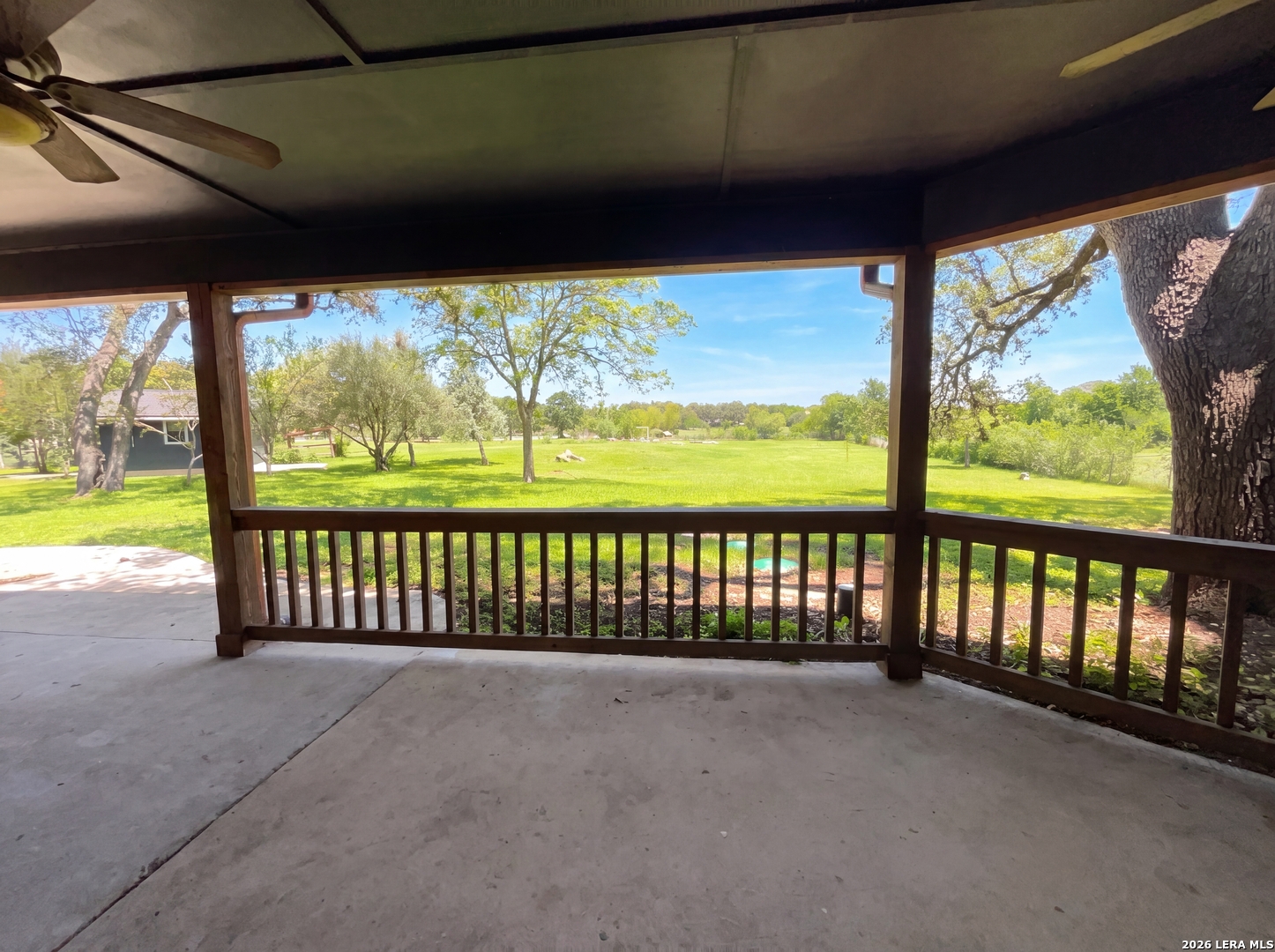 15422 Geronimo Loop San Antonio, TX 78254 - Photo 7 of 21 a view of porch with a floor to ceiling window and outside view