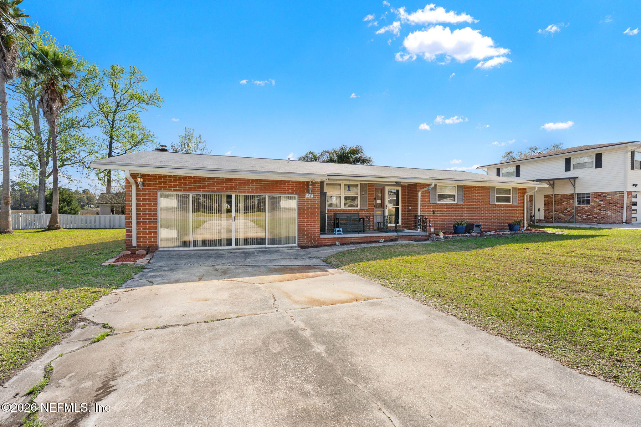 284 Baisden Road Jacksonville, FL 32218 - Photo 18 of 39 a view of a house with a swimming pool