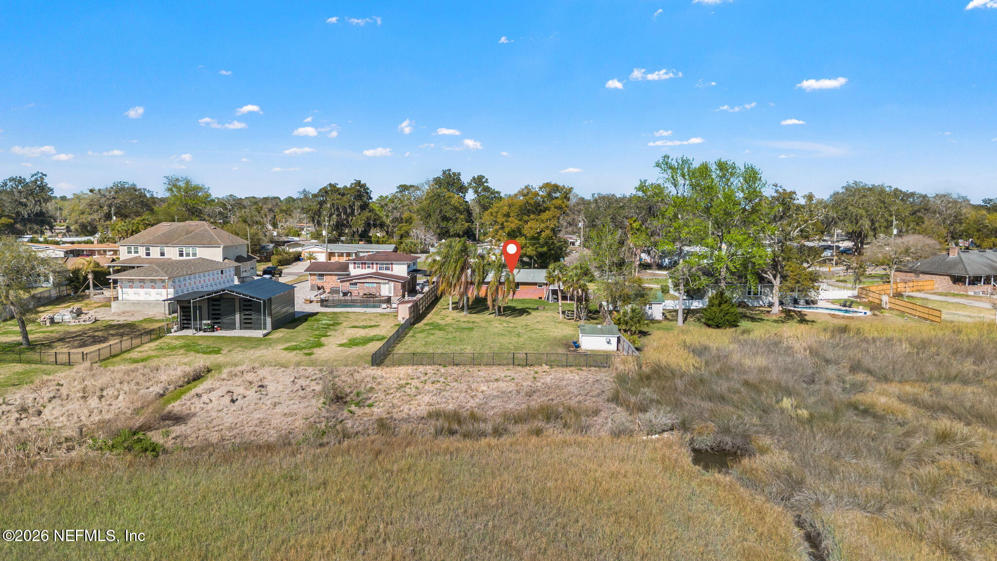 284 Baisden Road Jacksonville, FL 32218 - Photo 3 of 39 a view of a park with large trees